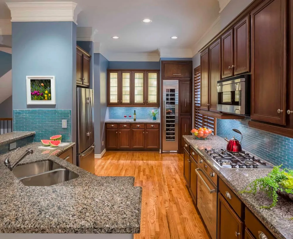 countertops and colourful backsplash in modern kitchen
