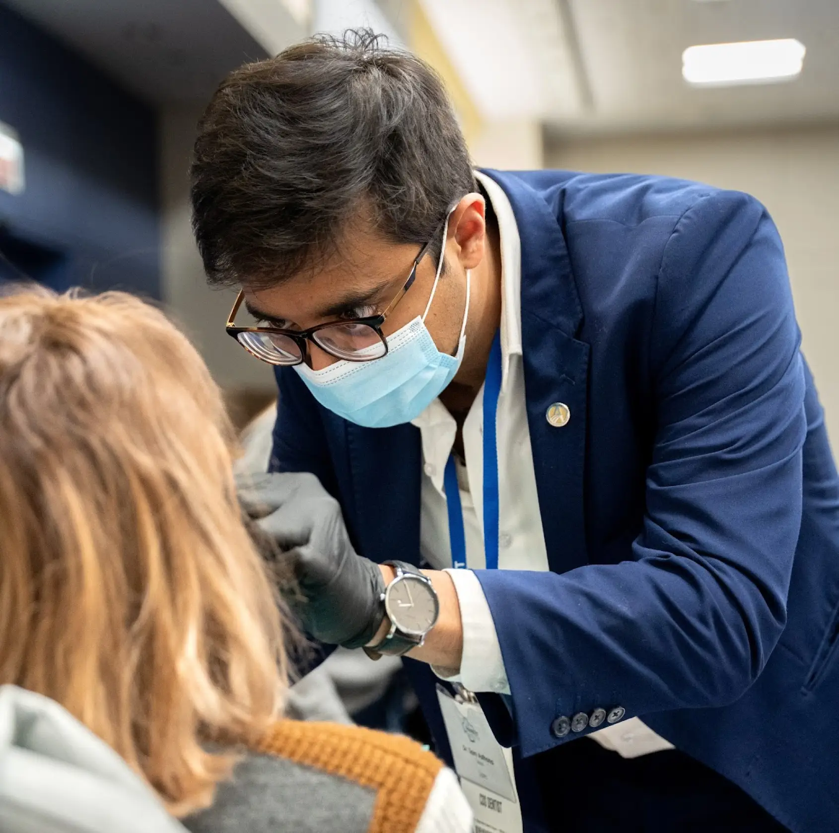 Dr. Sam performing TMJ treatment