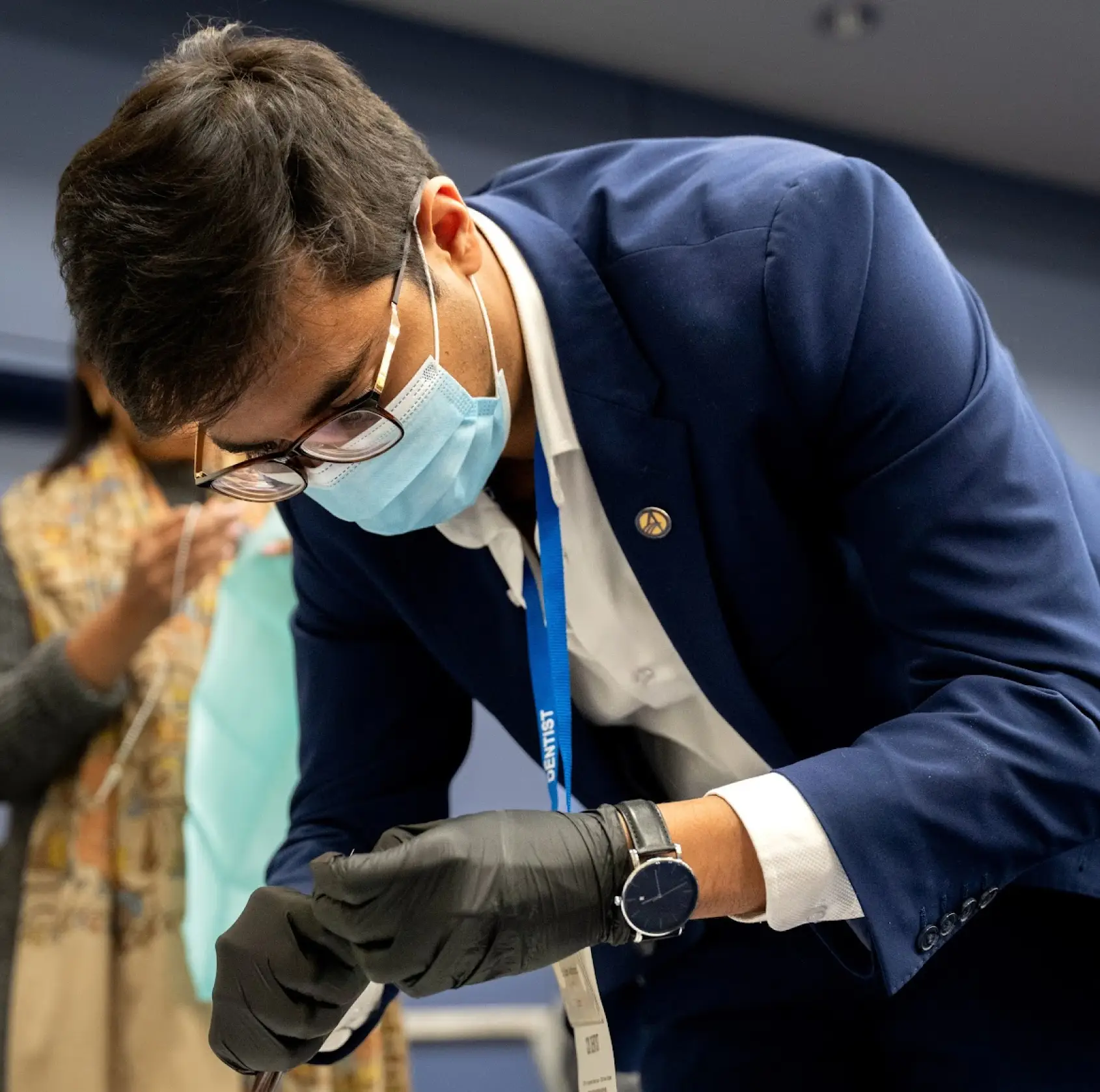 Dr. Sam performing TMJ treatment