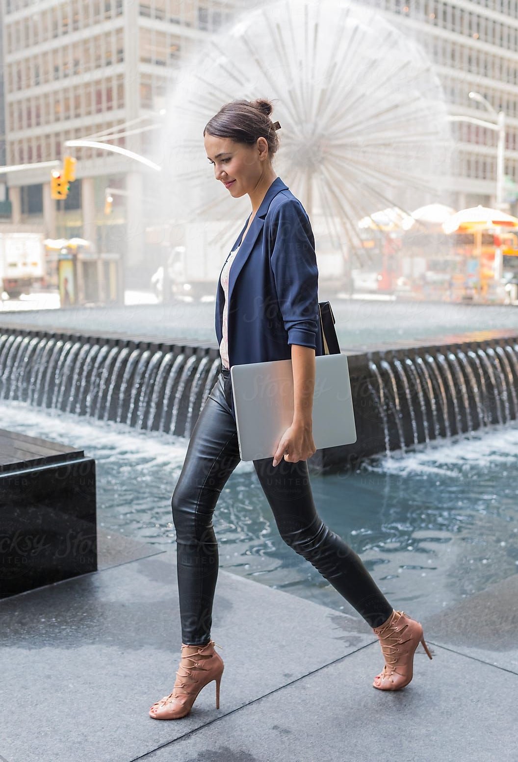 A young professional woman dressed for work.