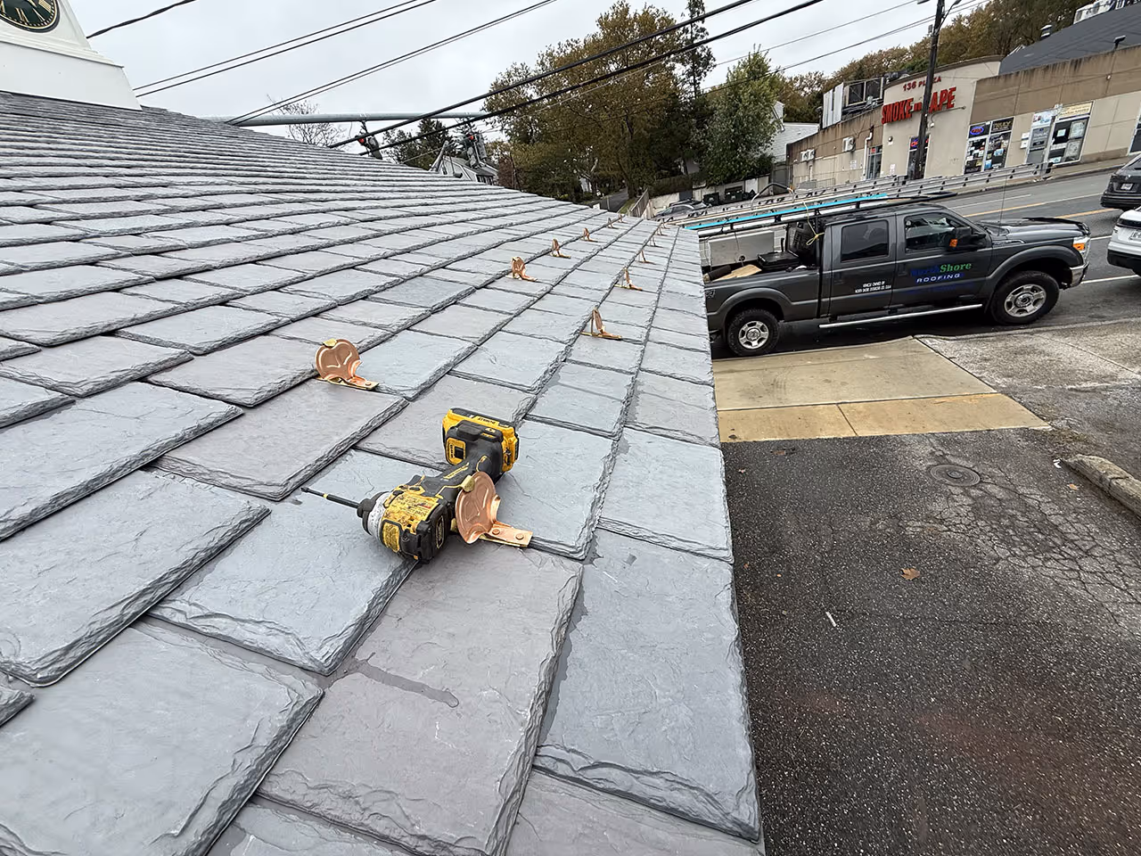 synthetic slate roofing being installed in long island ny