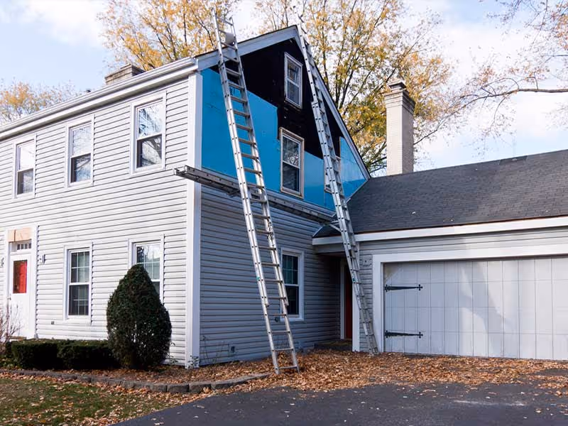 Siding installation on residential home exterior