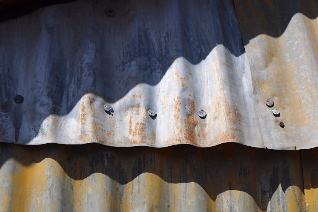 rusted commercial metal roof seams