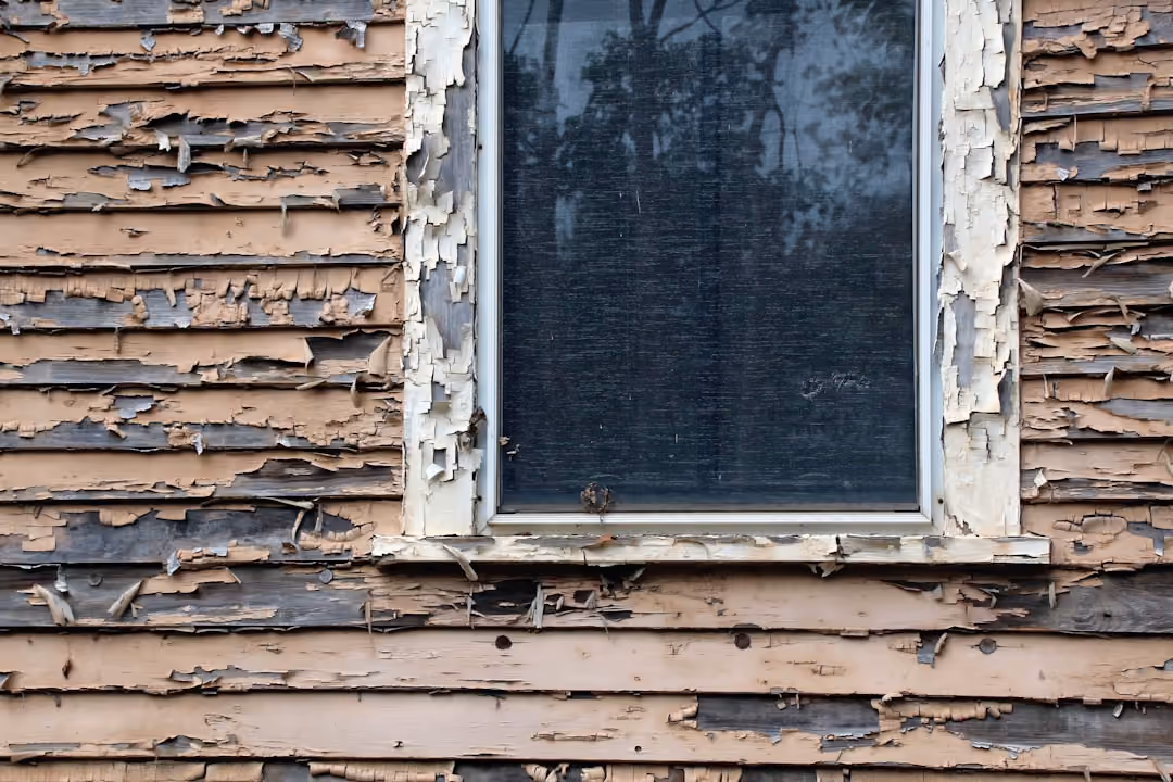 water-damaged T1-11 siding without proper flashing