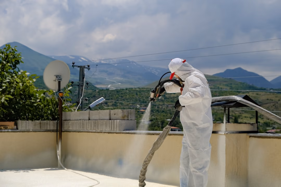 Applying a reflective liquid roof coating to restore a commercial roof Applying a reflective liquid roof coating to restore a commercial roof
