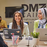 Team members at DMZ Cairo discussing systems and processes that support operational growth for partner organizations.