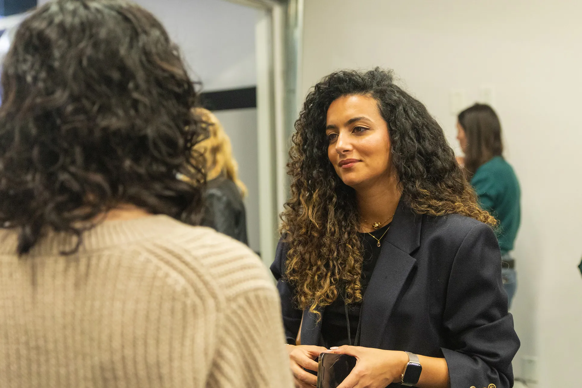 Female founder networking at DMZ’s Women Innovation Summit 2025, a high-impact event uniting women leaders, investors, and entrepreneurs to drive inclusive innovation and bold conversations.