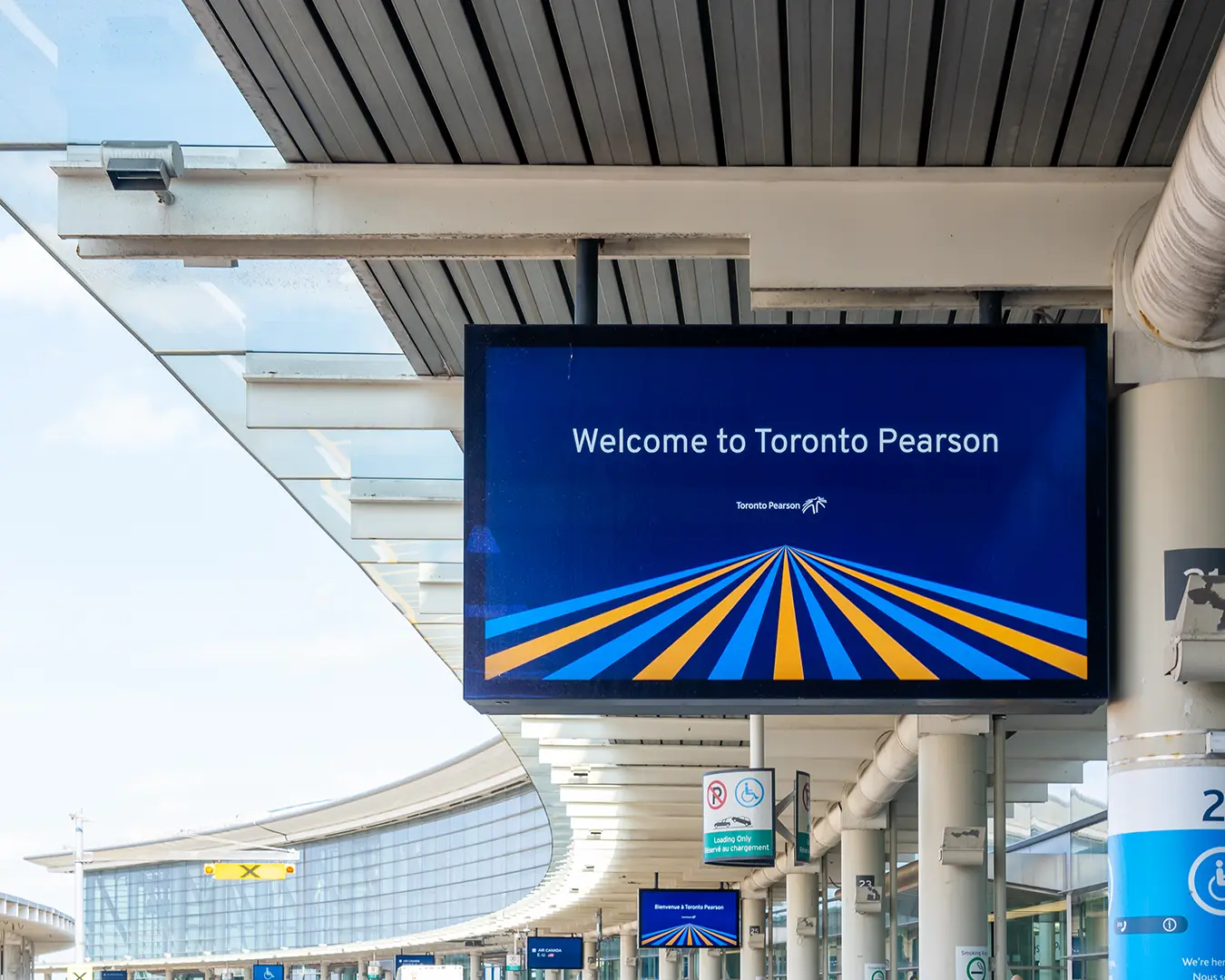 Welcome to Toronto Pearson International Airport sign greeting travelers arriving at Canada’s busiest airport