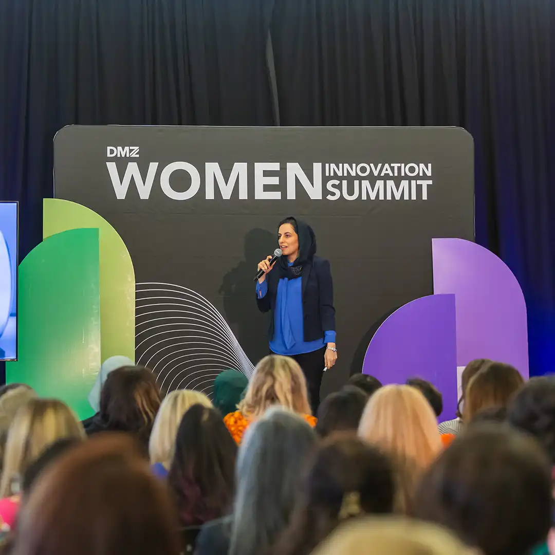 A women entrepreneur pitching on stage at the DMZ Women Innovation Summit 2026