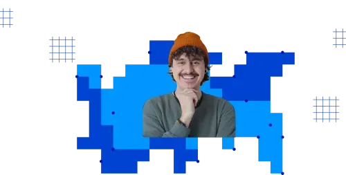 Smiling man with a mustache wearing an orange beanie and gray sweatshirt, resting his chin on his hand, against a blue pixelated and grid design background.