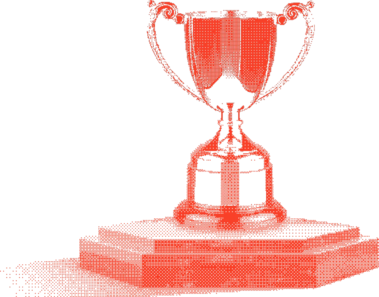 Red trophy cup with ornate handles on a multi-tiered hexagonal base.