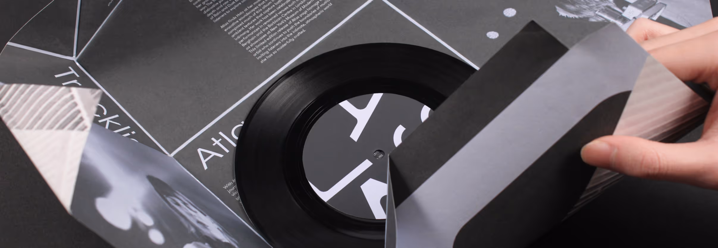 Closeup of vinyl packaging being unfolded.