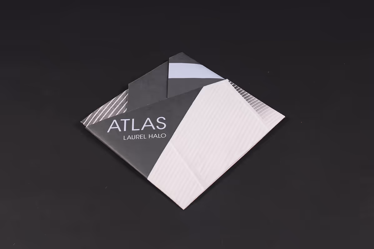 Folded poster into vinyl packaging,