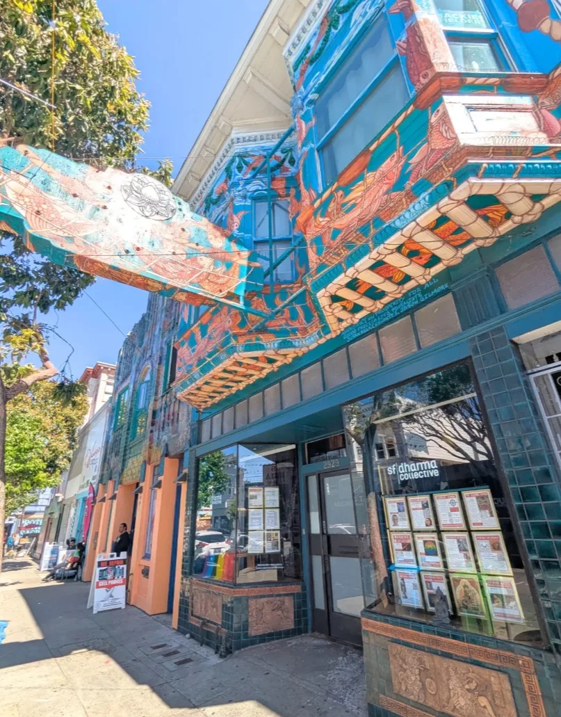 Exterior of the San Francisco Dharma Collective building on 24th Street in the Mission District.