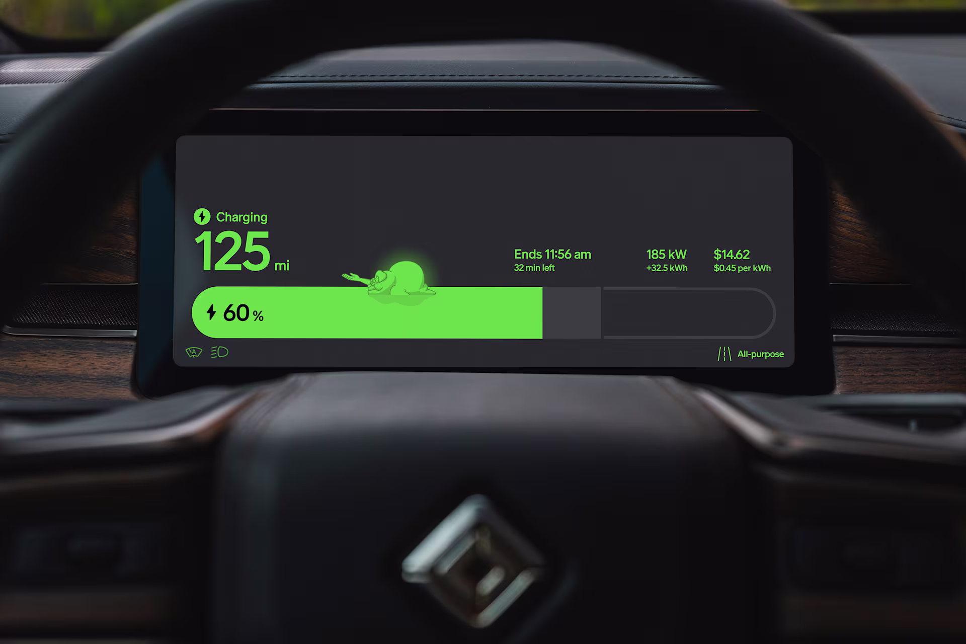 The driver display while charging: 125 miles, 60 percent, a green charge bar with a slime ghost.