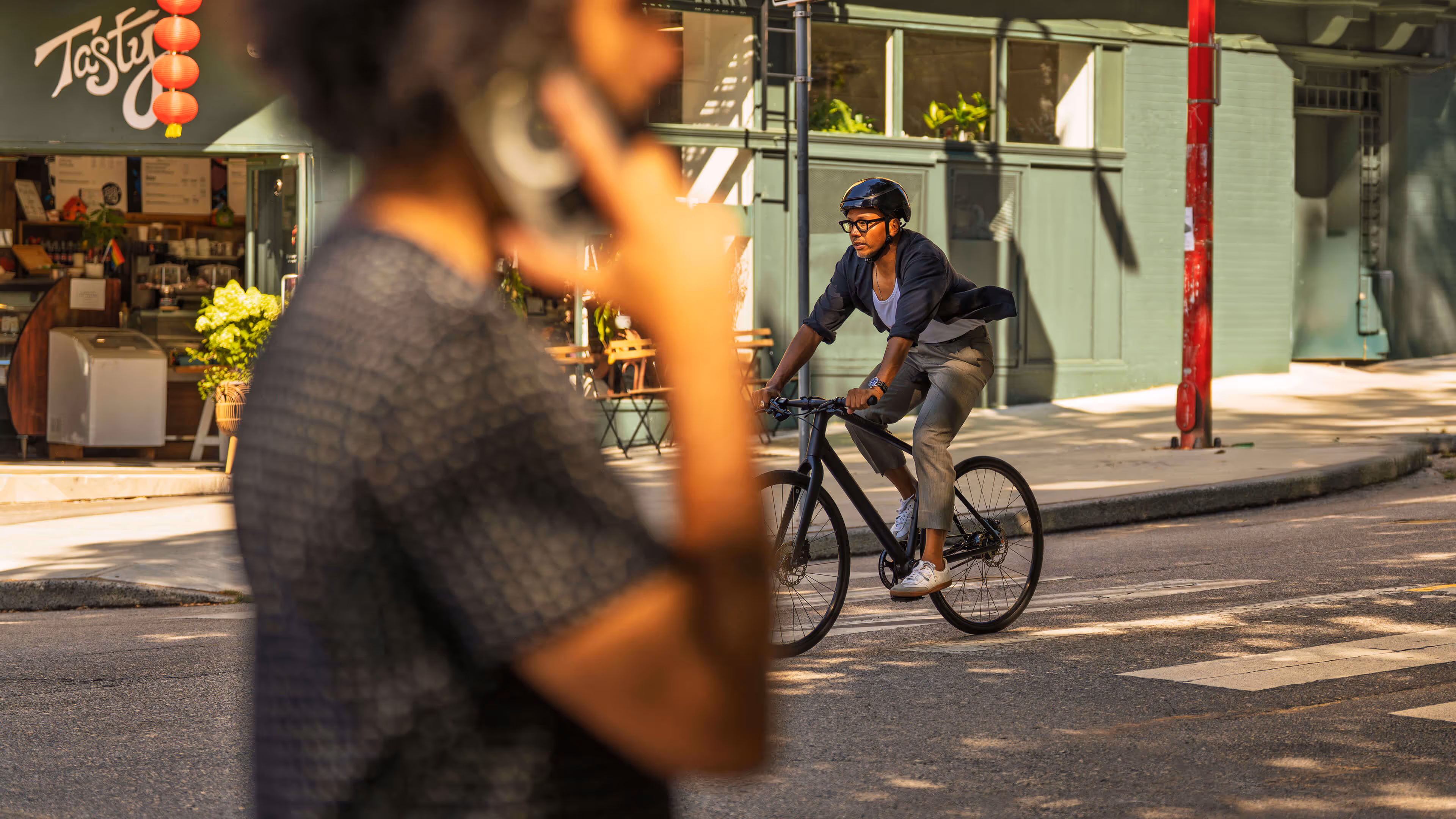 Man riding his bike on city street