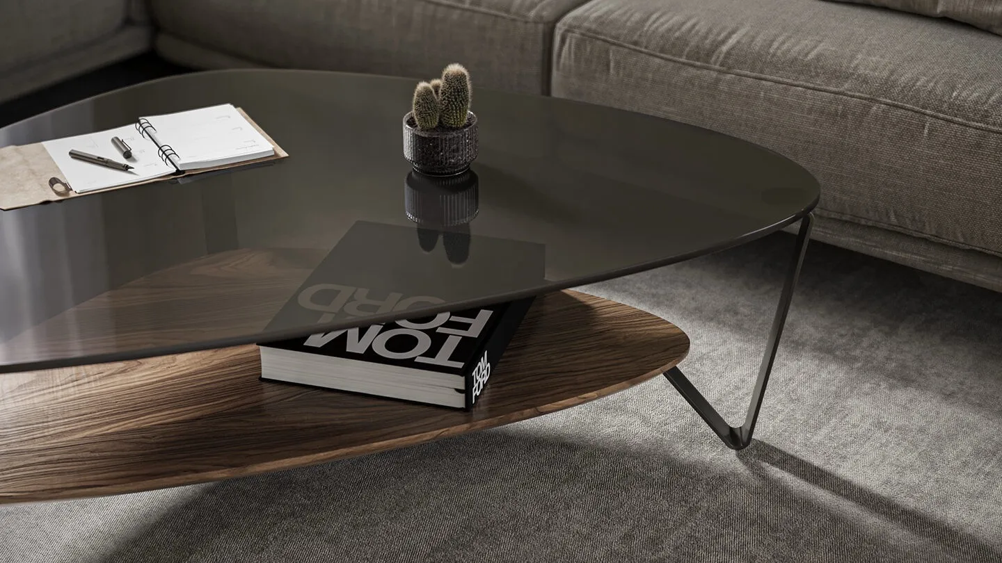 BDI glass coffee table next to grey sofa