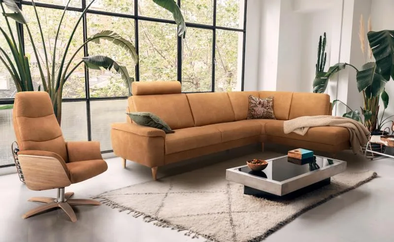 Hjort Knudsen brown leather living room set with brown accent chair and brown leather sectional sofa 