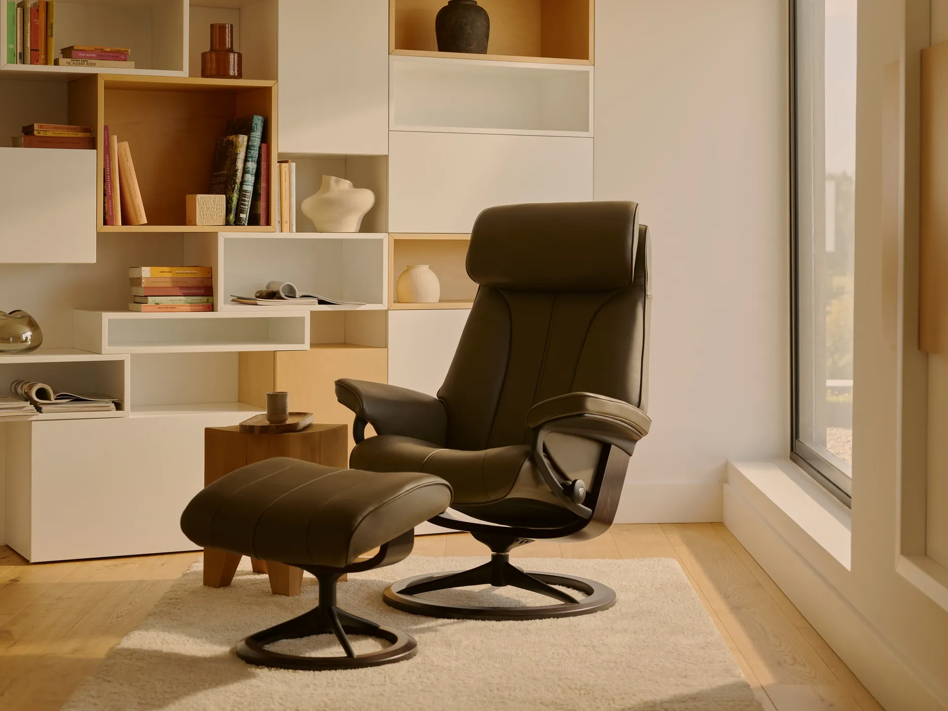 Stressless Paul recliner sitting in a warmly lit living room