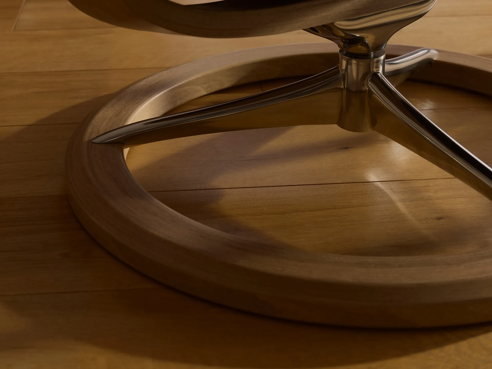 Closeup shot of rounded base of Stressless Mayfair chair