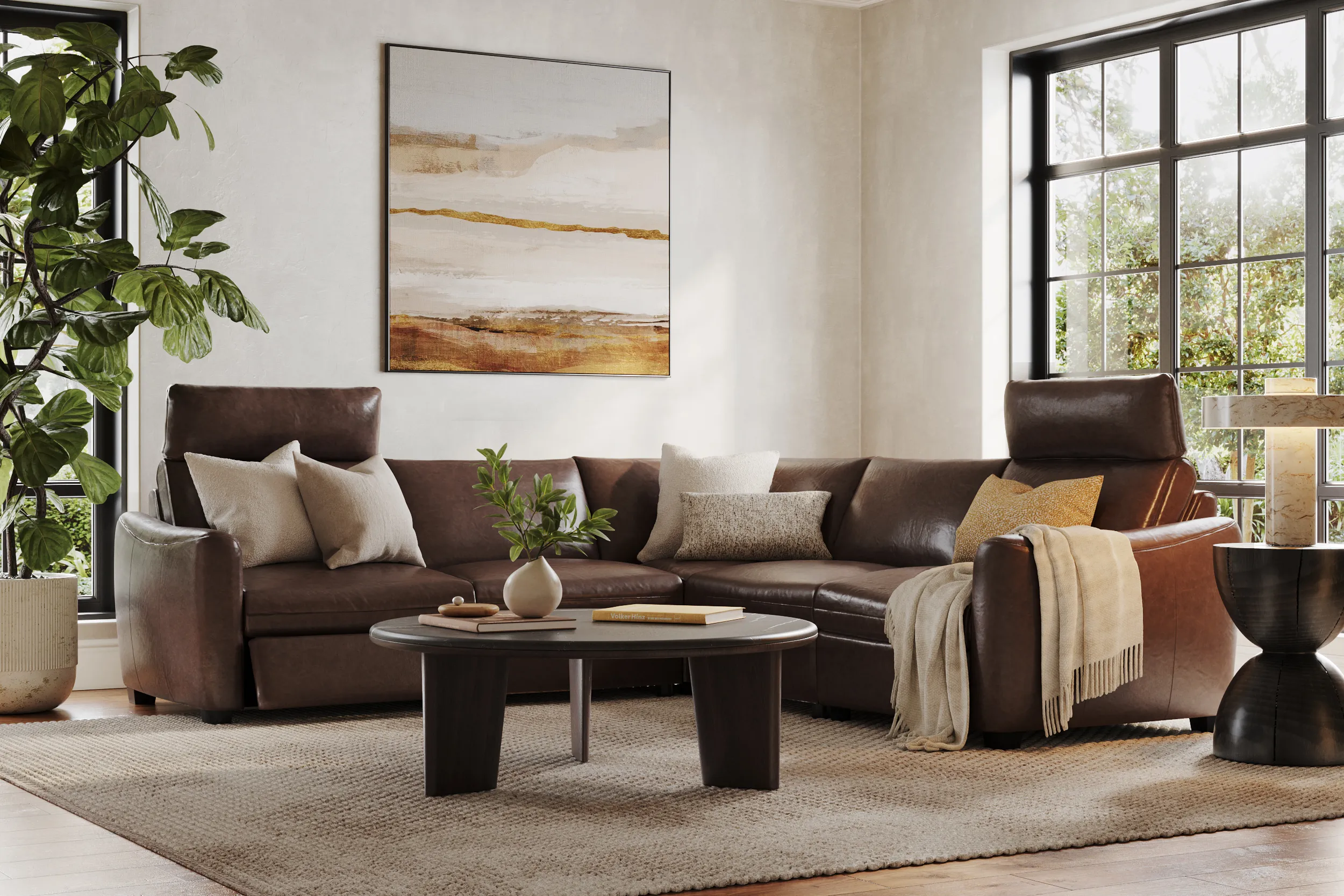 Dark brown leather Palliser sectional with yellow pillow and dark brown circular coffee table to match