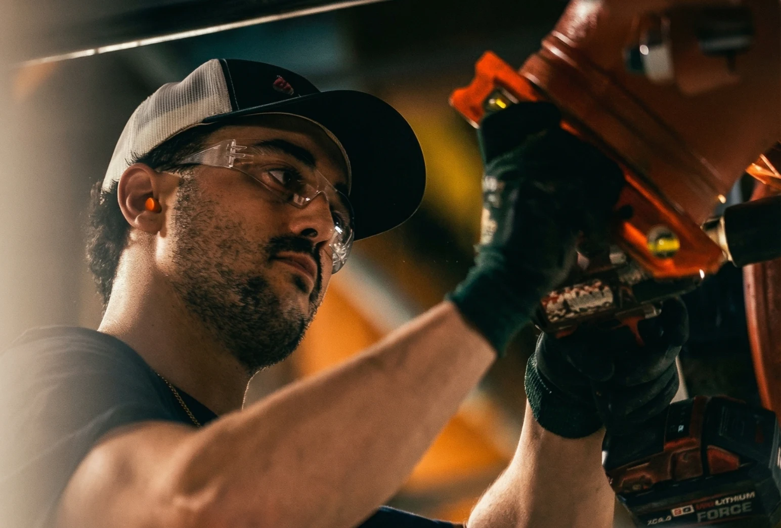 Thor Plumbing technician installing copper piping on commercial construction project in Winnipeg