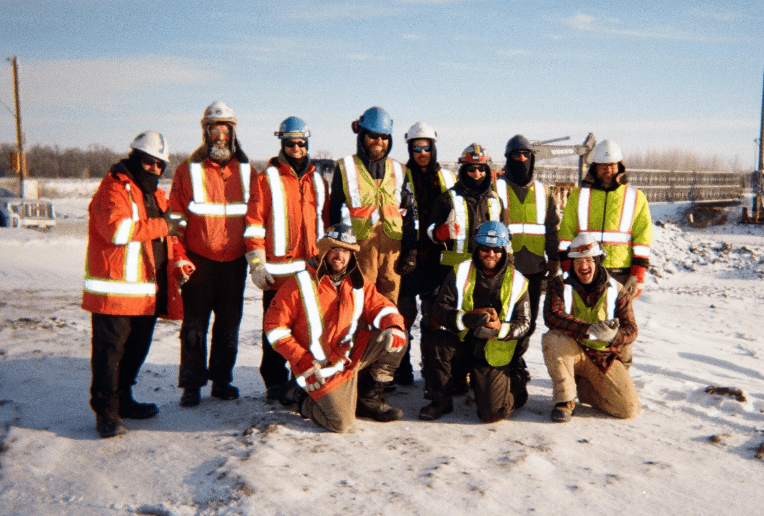 MD Steele Construction crew team photo at winter jobsite in Manitoba