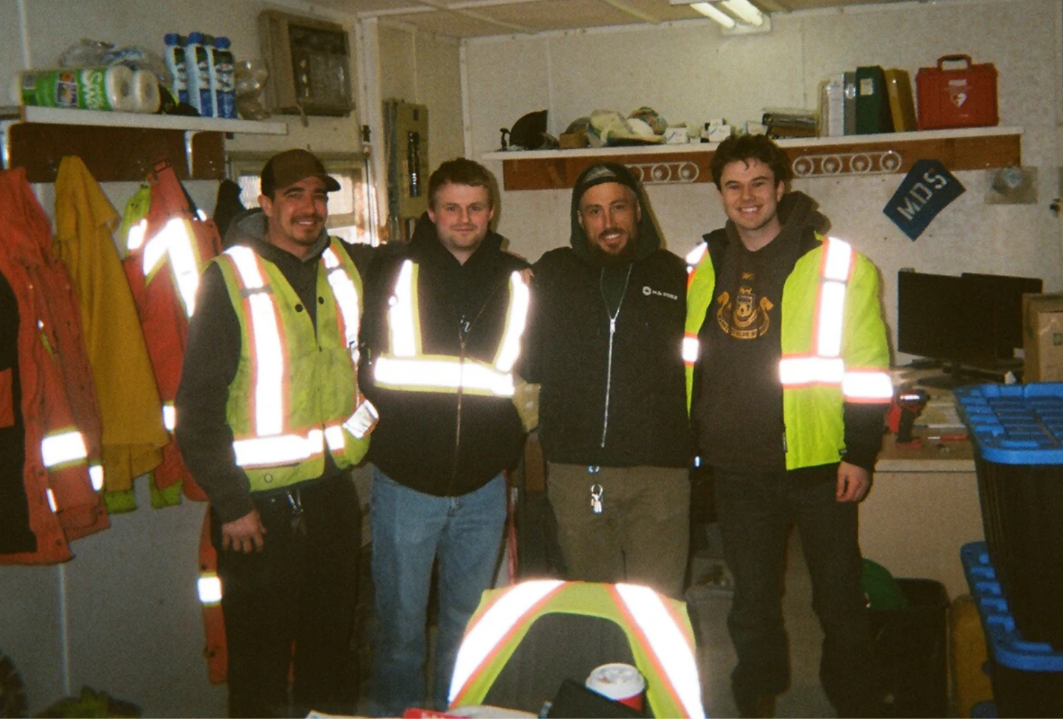 Journeyman Marketing team with MD Steele Construction crew at jobsite trailer in Winnipeg