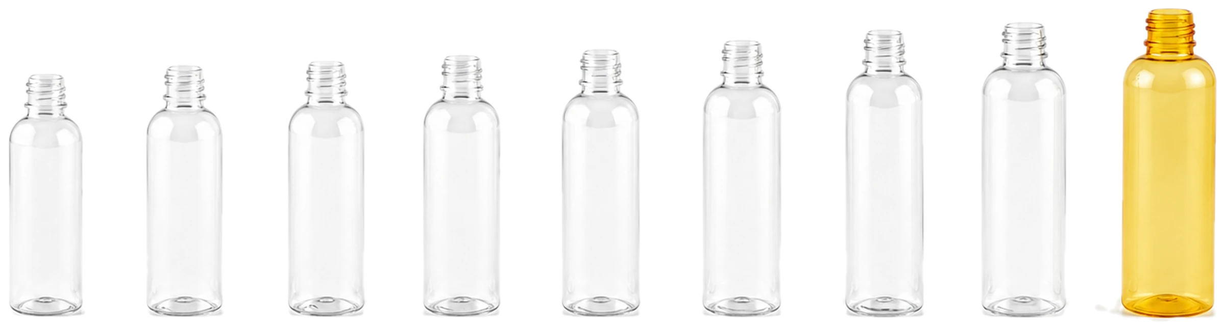 Nine clear PET bottles and one amber PET bottle from Jadewell's stock catalog, arranged in a row