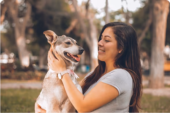 Therapist bonding with client and service dog during grief support session