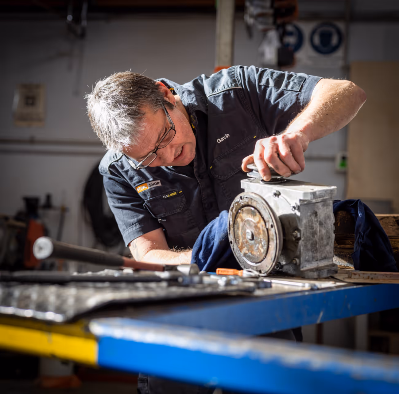 Man working in workshop. 