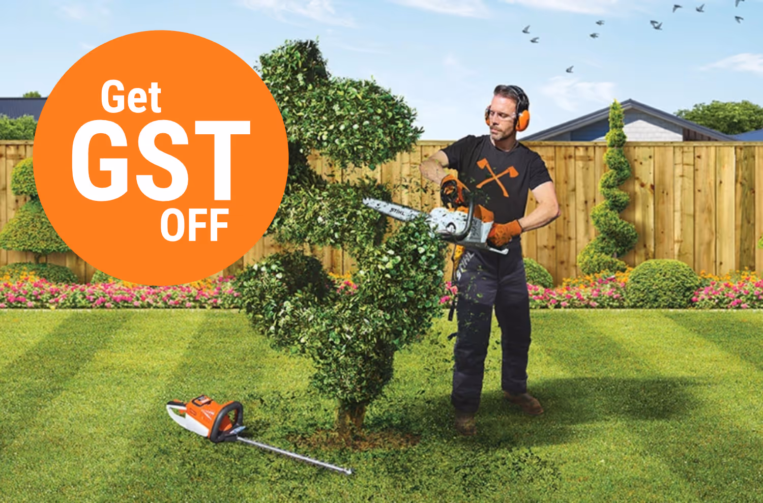 GST off promotion, man standing in yard. 