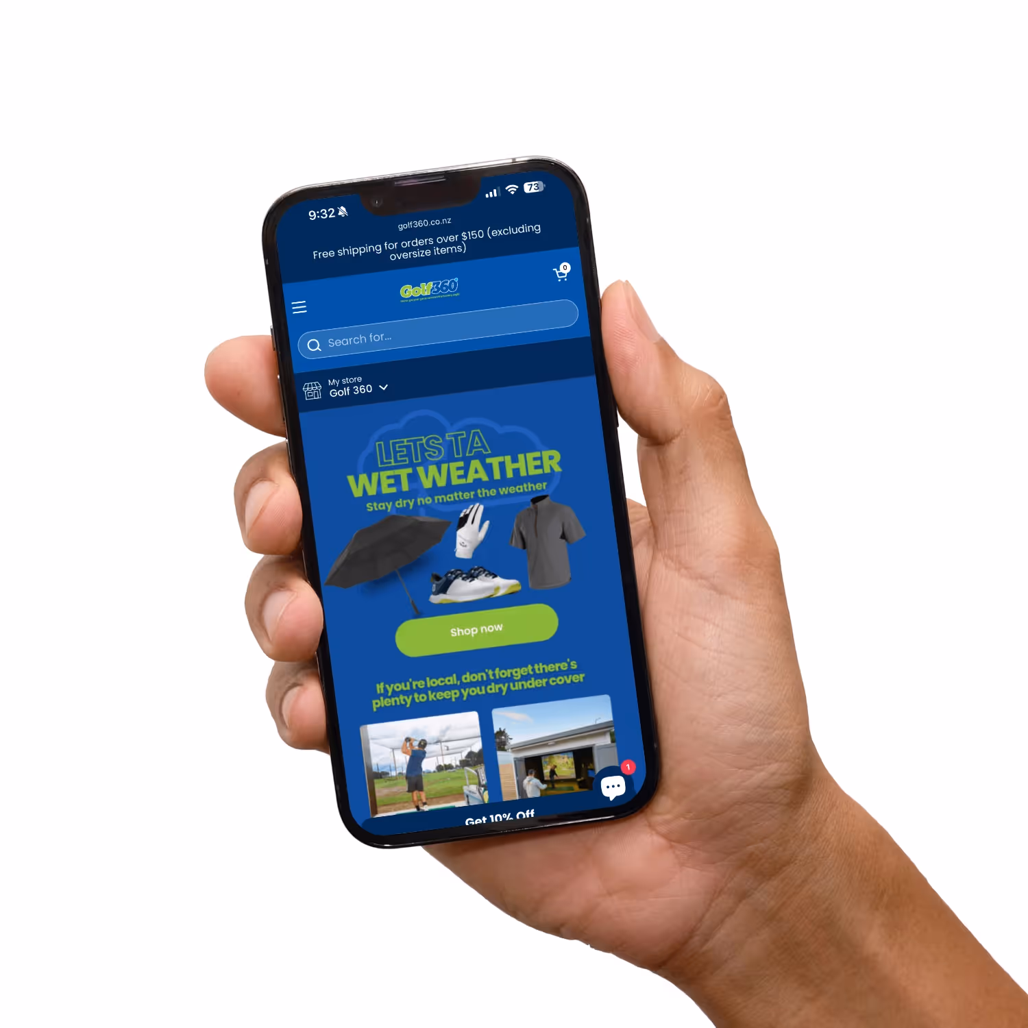 Hand holding mobile phone with website.