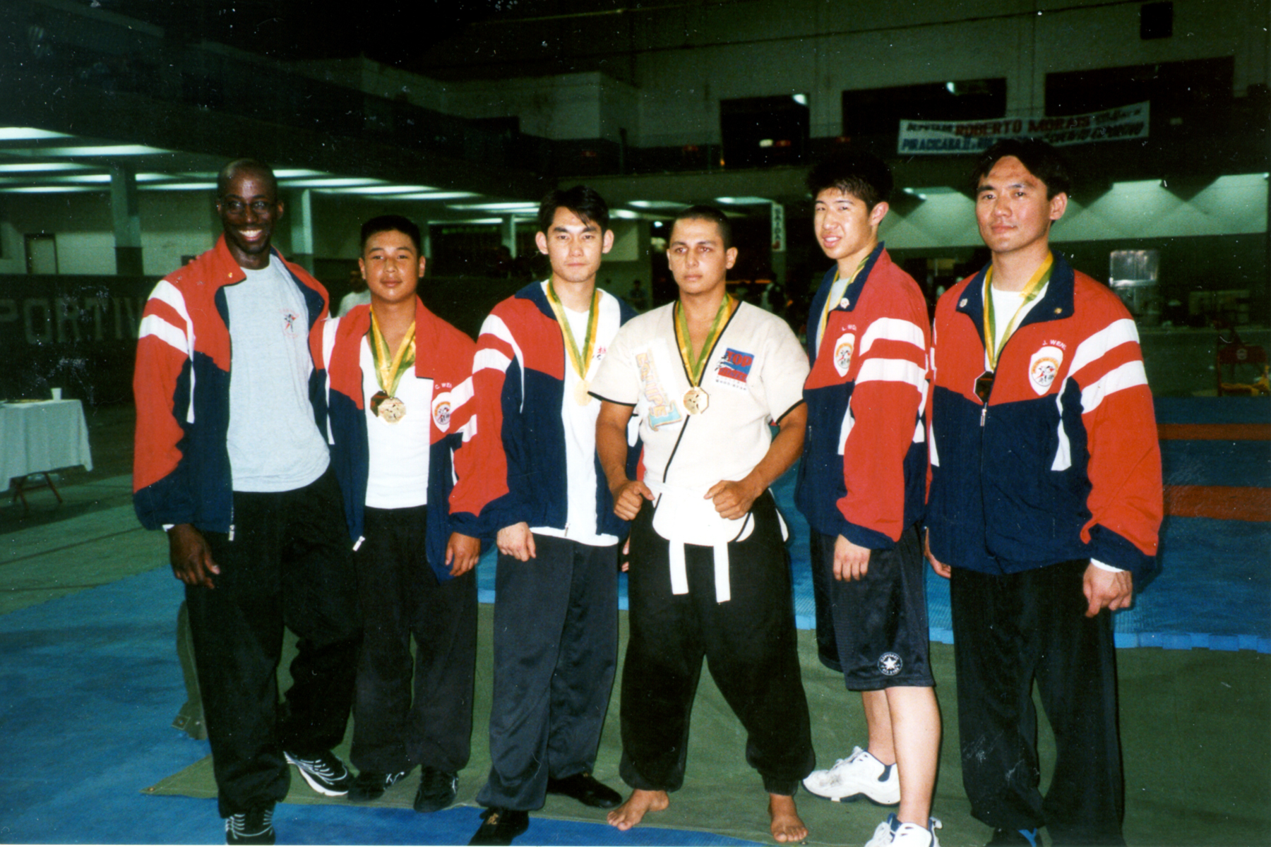 Team USA with a Brazilian competitor at the Pan American Invitational 2001