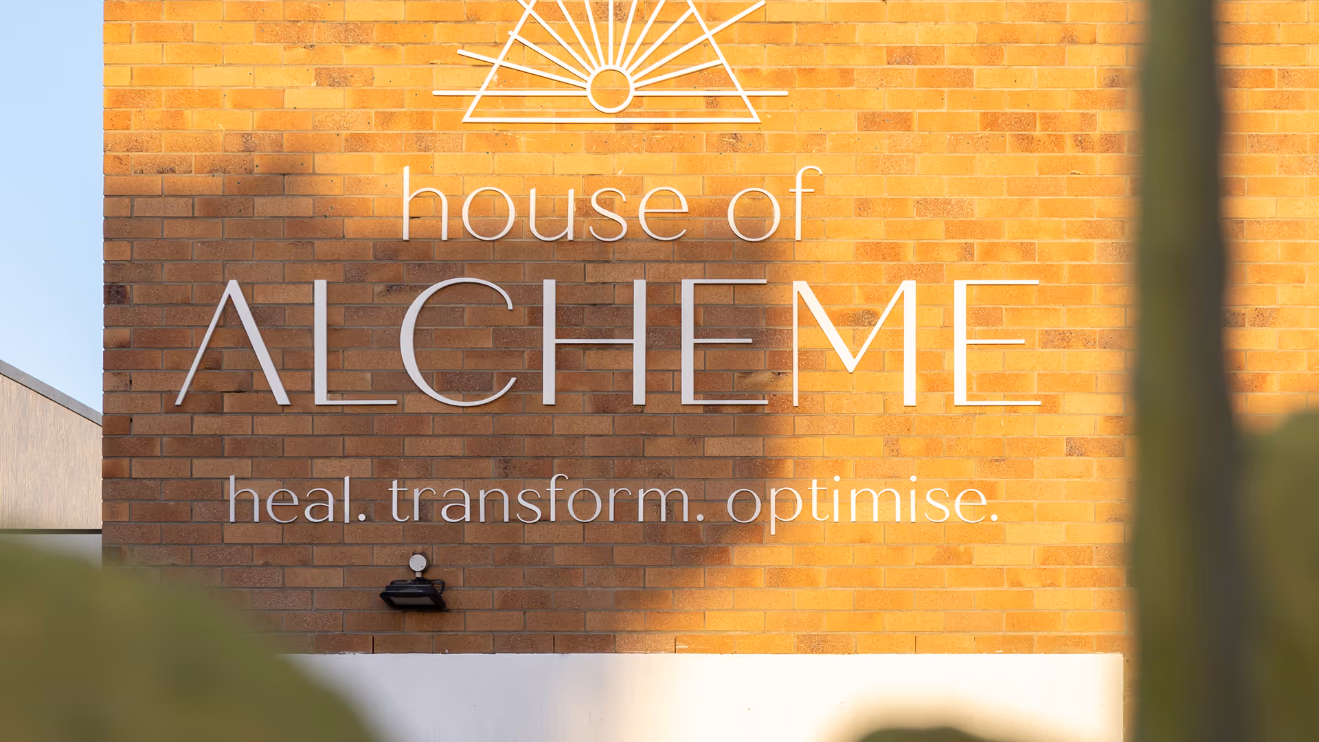 House of alcheme brick wall exterior view