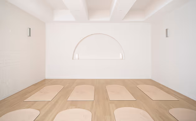 light event space with wood floor and yoga mats-1