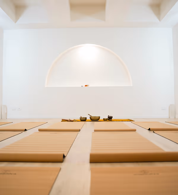 yoga mats on floor white space with arched wall