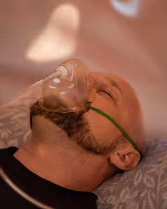 Oxygen Therapy man with a mask on