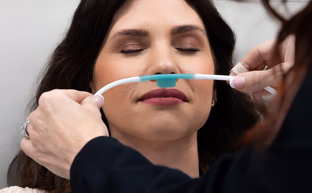 Molecular Hydrogen being applied to patient by lady