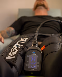 Lymphatic Massage Boots Device man laying down