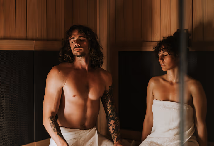 Contrast Therapy couple in white towels in sauna