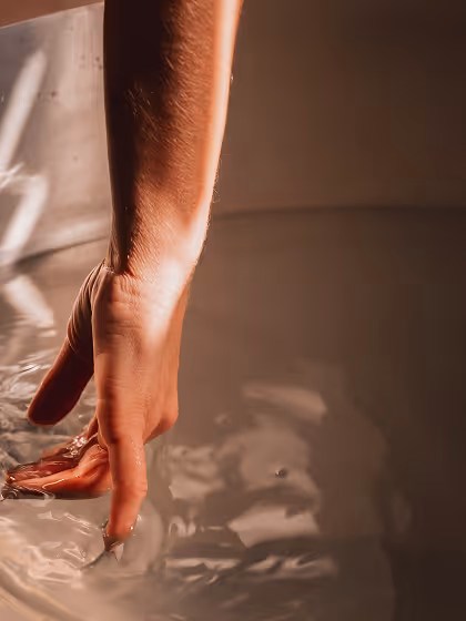 Contrast Therapy hand touching ice bath