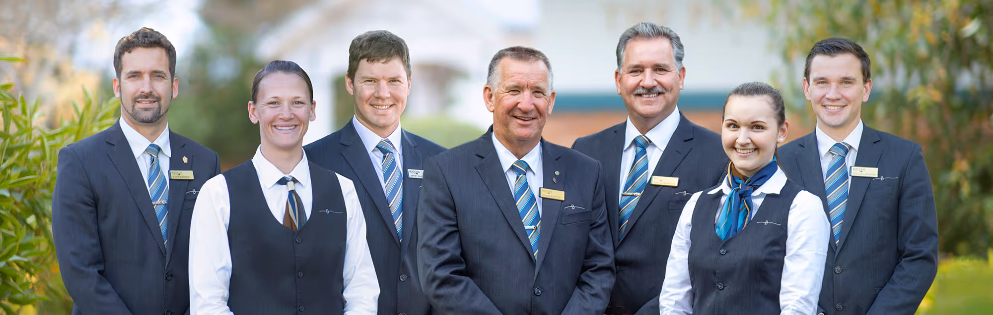 A team of seven funeral care professionals.