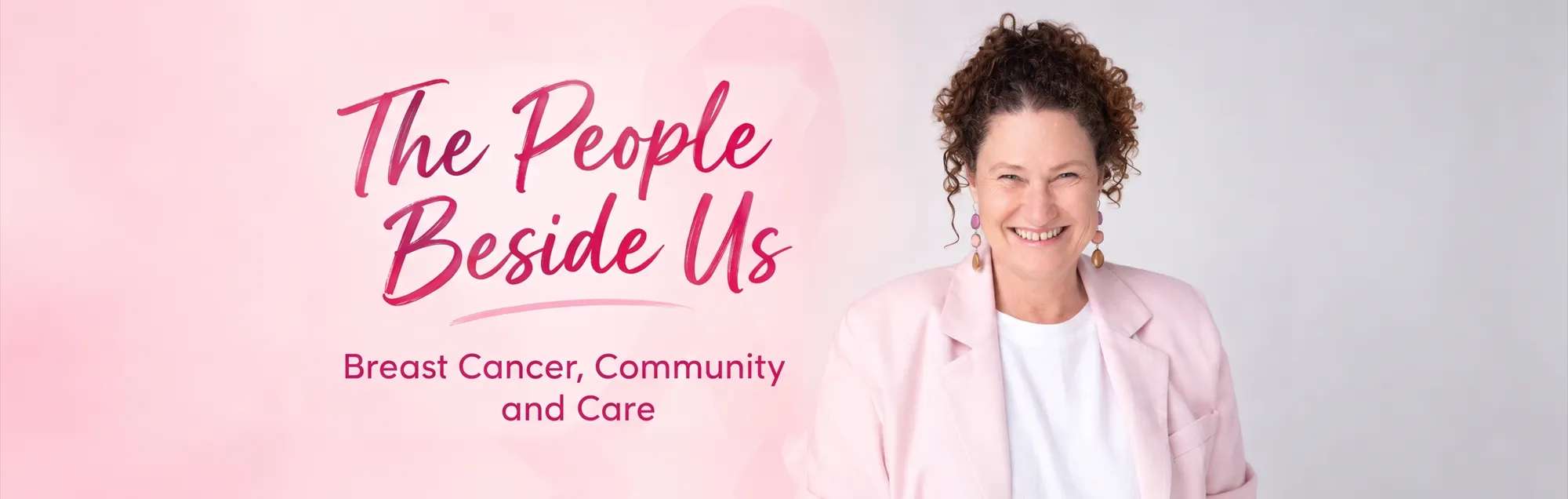 A graphic featuring a smiling woman with curly hair alongside pink cursive text reading "The People Beside Us" and "Breast Cancer, Community and Care" against a light pink background with a subtle ribbon watermark.