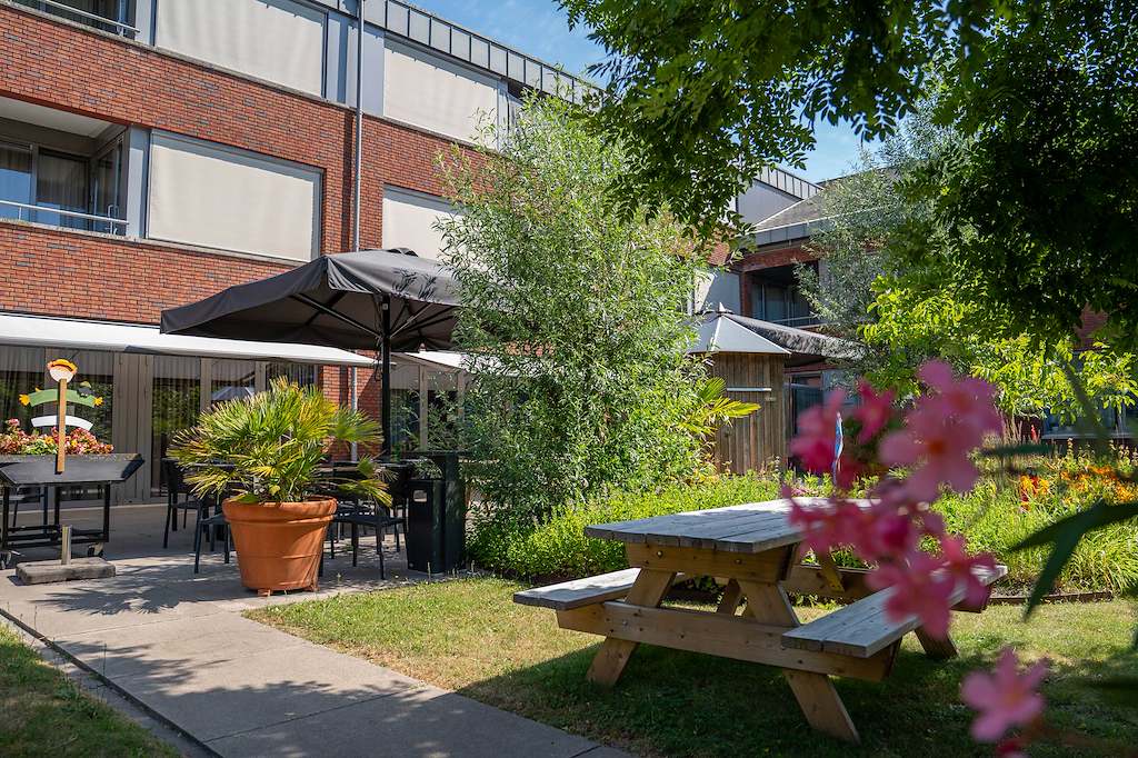Woonzorglocatie De Stroming sfeerbeeld binnentuin
