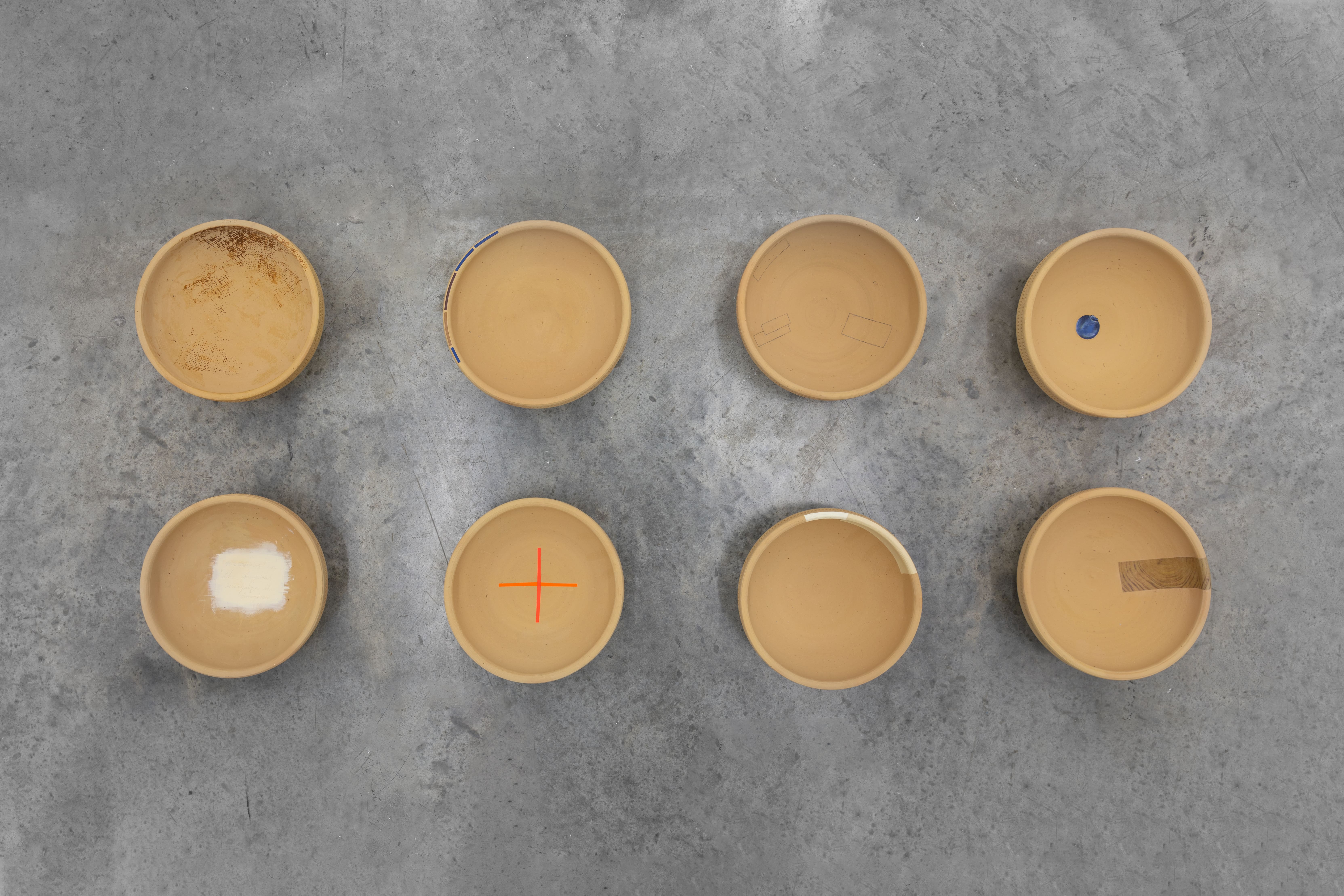 Contained Gesture, 2019, Acrylic, paper, gel transfer and graphite on collected clay pots, Eight parts, 16.5 x 16.5 x 7 cm each, 6 1/2 x 6 1/2 x 2 3/4 in each