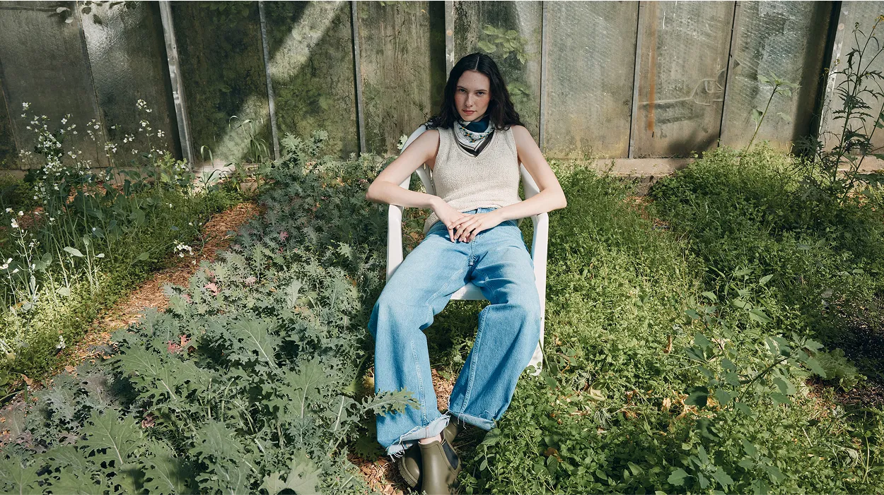 A woman sitting on a chair wearing new fasion