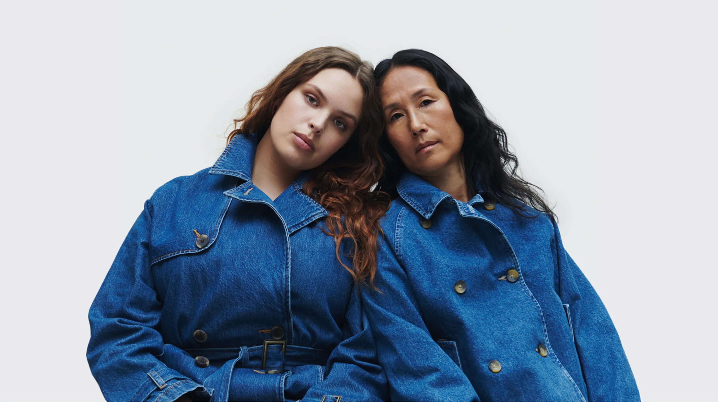 Two women wearing denim