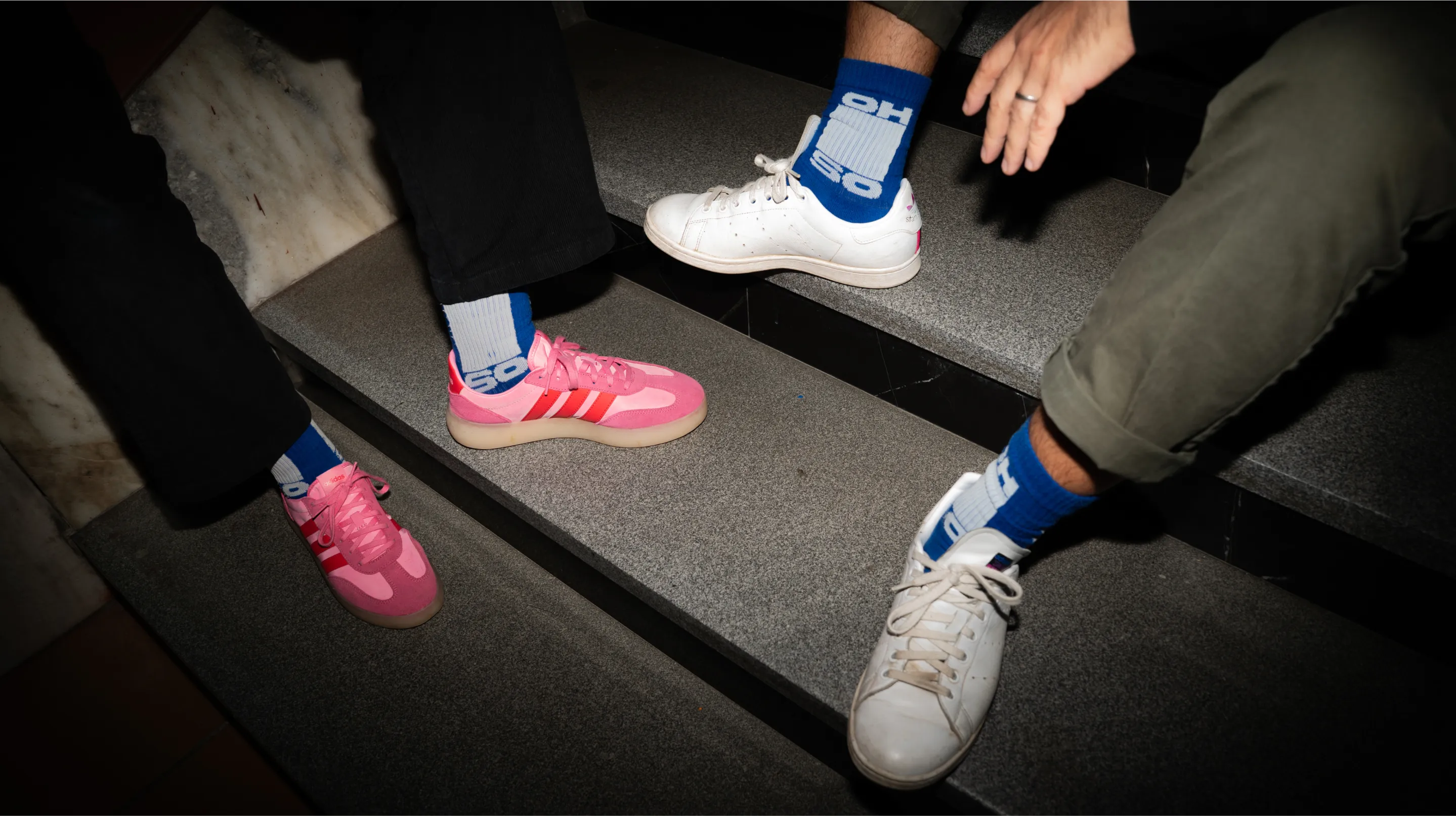 OH-SO team members showing the team socks in blue.