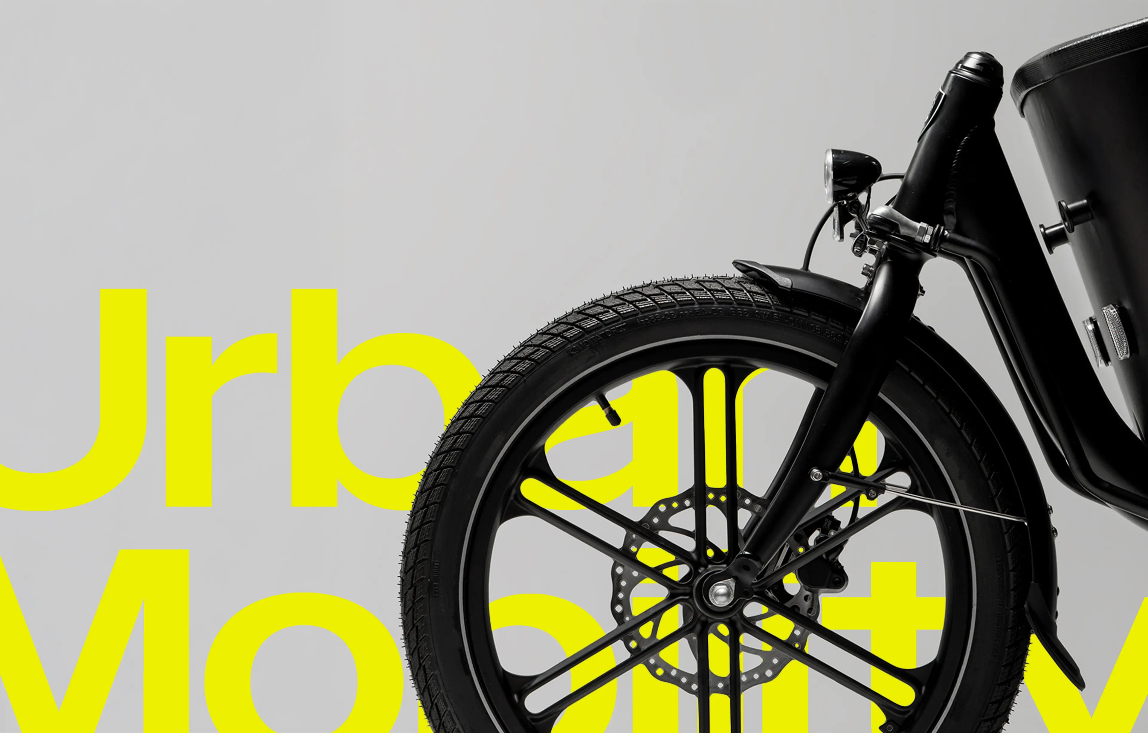 cargobike wheel and yellow text